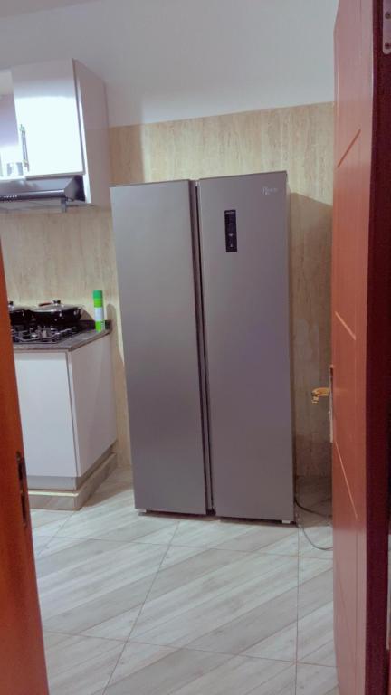 Kuchyň nebo kuchyňský kout v ubytování Appartement Yaoundé 2 chambre haut standing