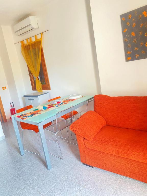 Zona de estar de White House in Cannigione