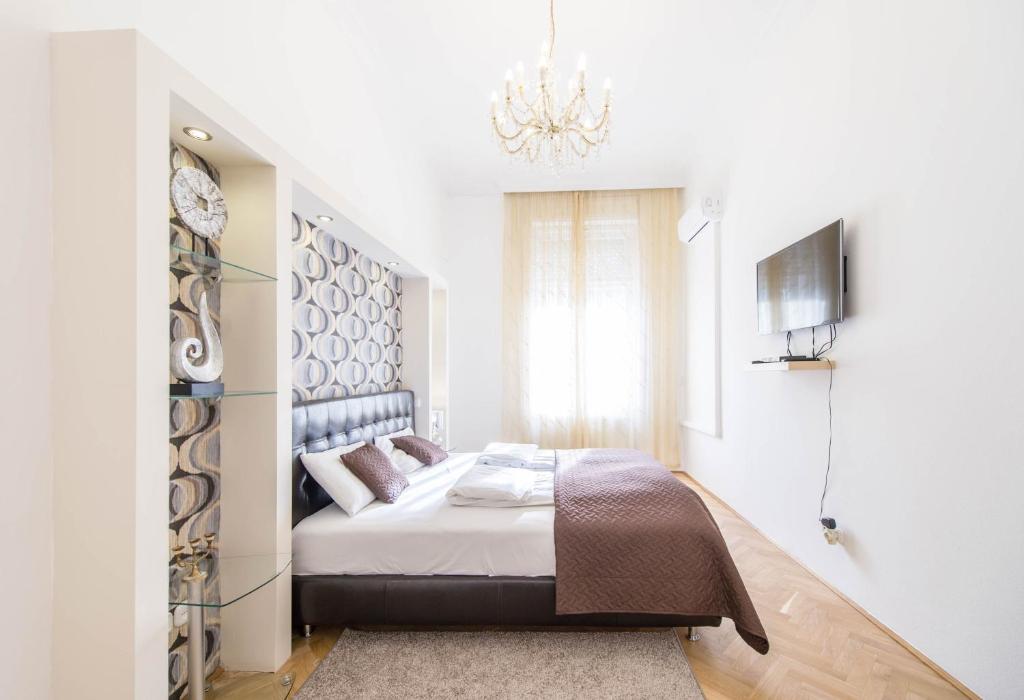 Posteľ alebo postele v izbe v ubytovaní Spirit Nádor Ter Apartment