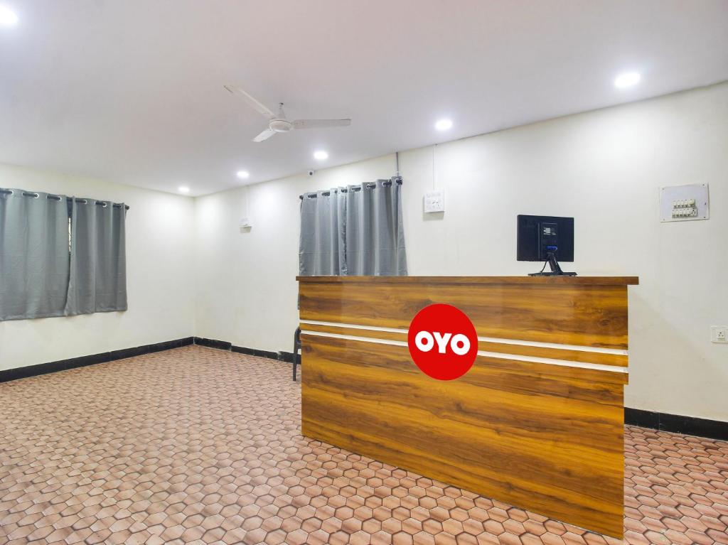 Μια τηλεόραση ή/και κέντρο ψυχαγωγίας στο Hotel O Happy Homes