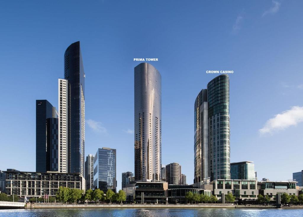 a rendering of a city skyline with tall buildings at Prima Tower - Premium Apartment with City and Flames Views in Melbourne
