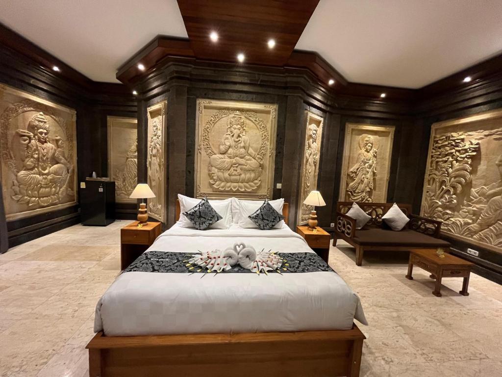Ένα ή περισσότερα κρεβάτια σε δωμάτιο στο Arbathu Villa Ubud