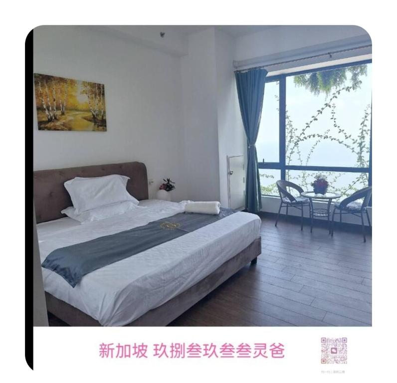 Postel nebo postele na pokoji v ubytování Carnelian Tower 森林城市海景公寓