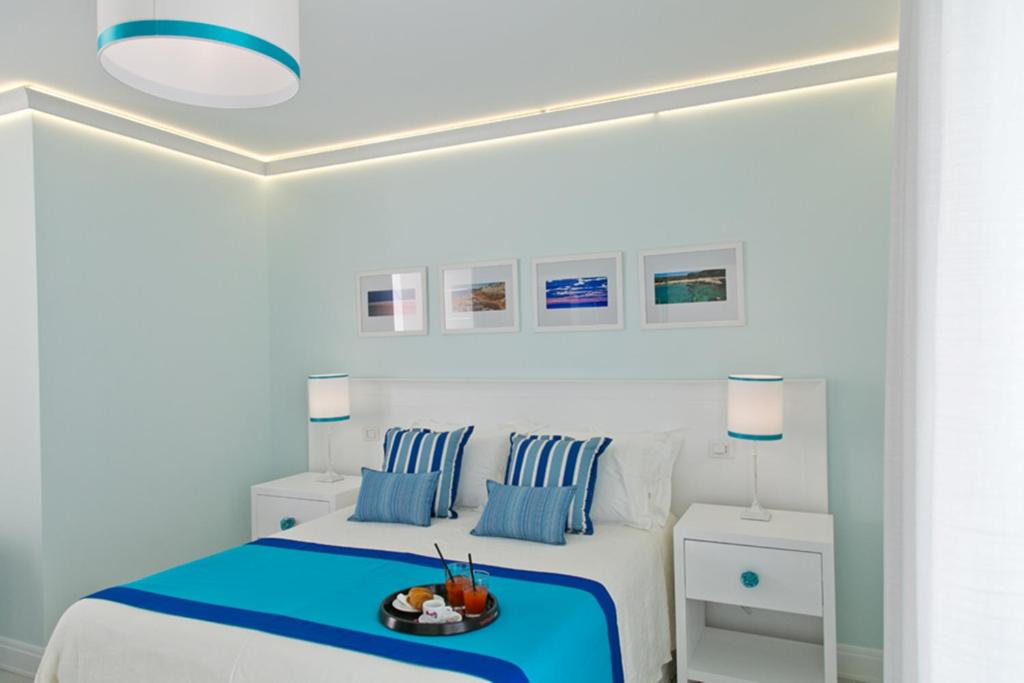 Postel nebo postele na pokoji v ubytování Terra d'Acqua Resort & SPA