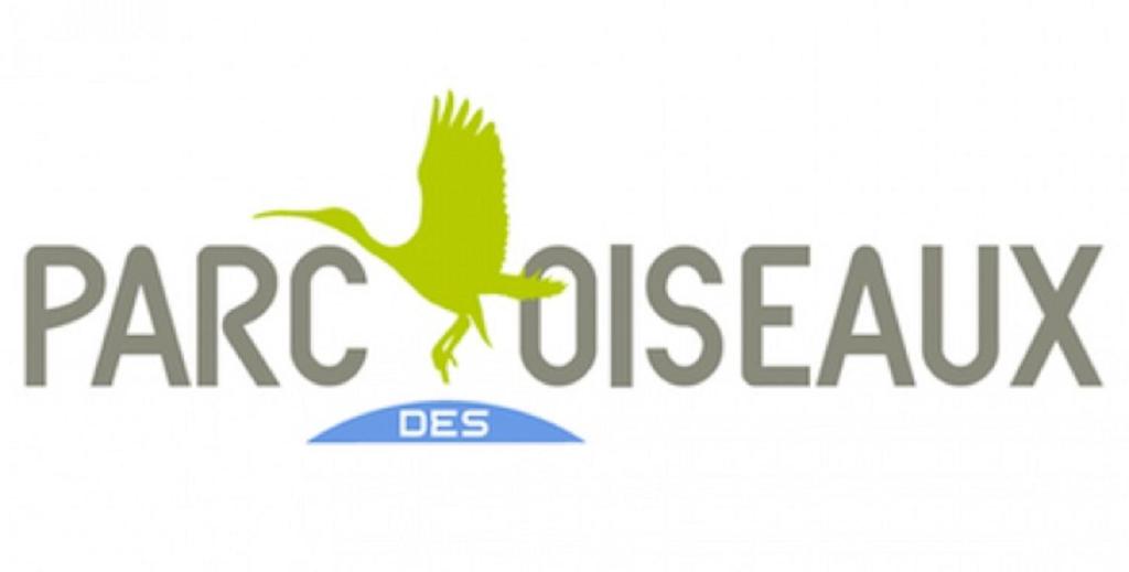 a logo for a parakeasy restaurant with a bird at Logis Hotel Le Petit Casset in La Boisse