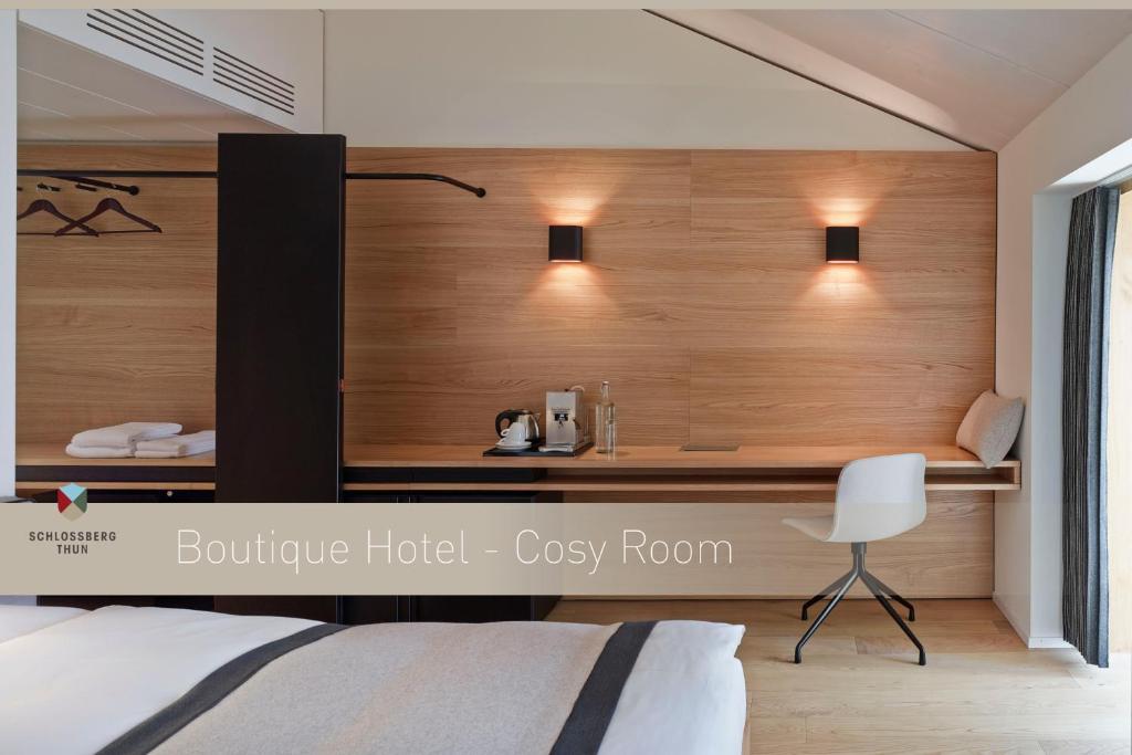 Postel nebo postele na pokoji v ubytování Boutique Hotel Schlossberg