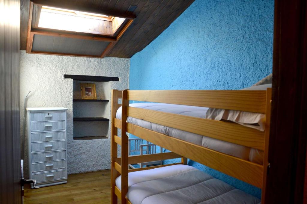 Postel nebo postele na pokoji v ubytování Mas Sabaters - L'Era de Sabaters