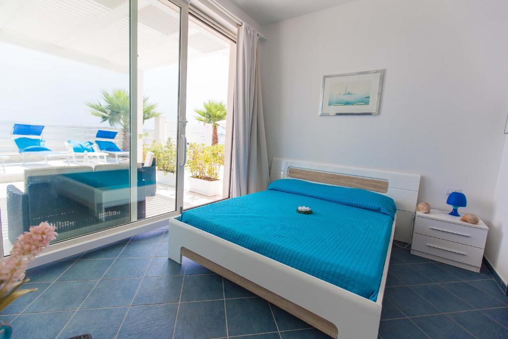 A bed or beds in a room at Villa Amateia