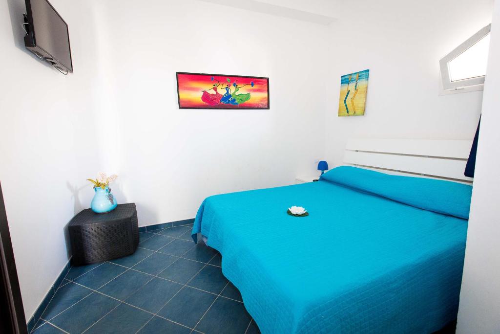 A bed or beds in a room at Villa Amateia