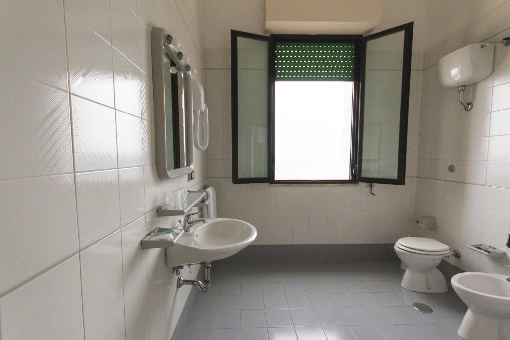 Koupelna v ubytování Albergo Palazzo