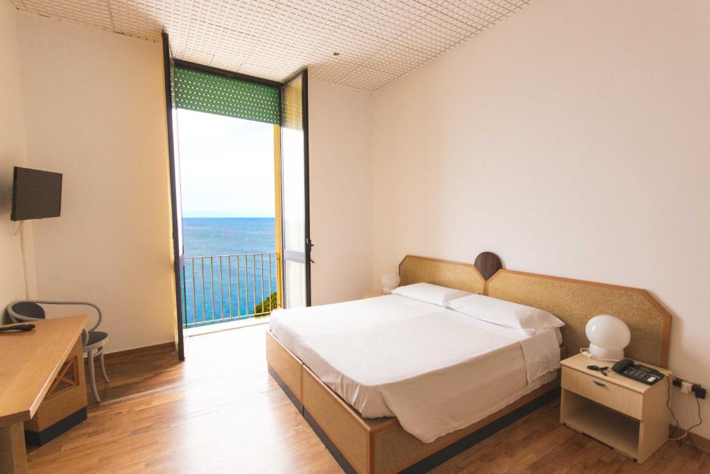 TV a/nebo společenská místnost v ubytování Albergo Palazzo
