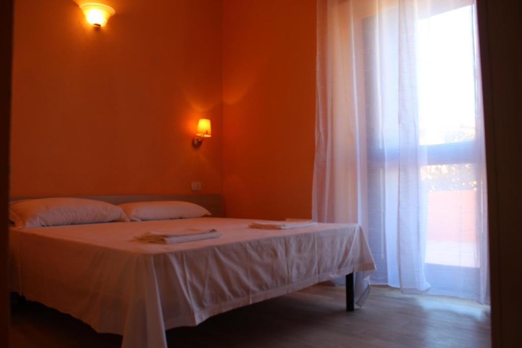 Letto o letti in una camera di B&B La Cantoniera