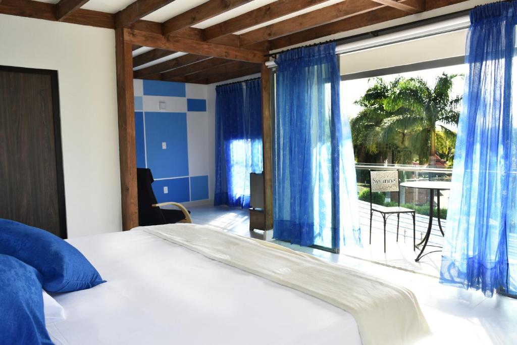 Postel nebo postele na pokoji v ubytování Hotel Syvanna Wellness and Spa