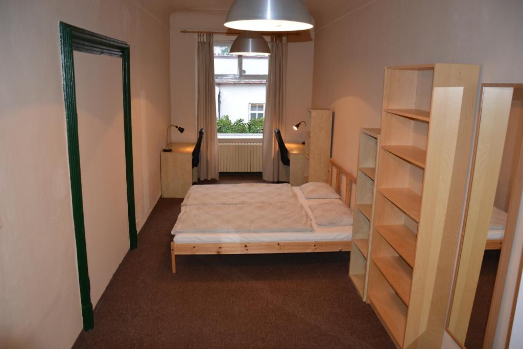 Postel nebo postele na pokoji v ubytování Apartments 163/I