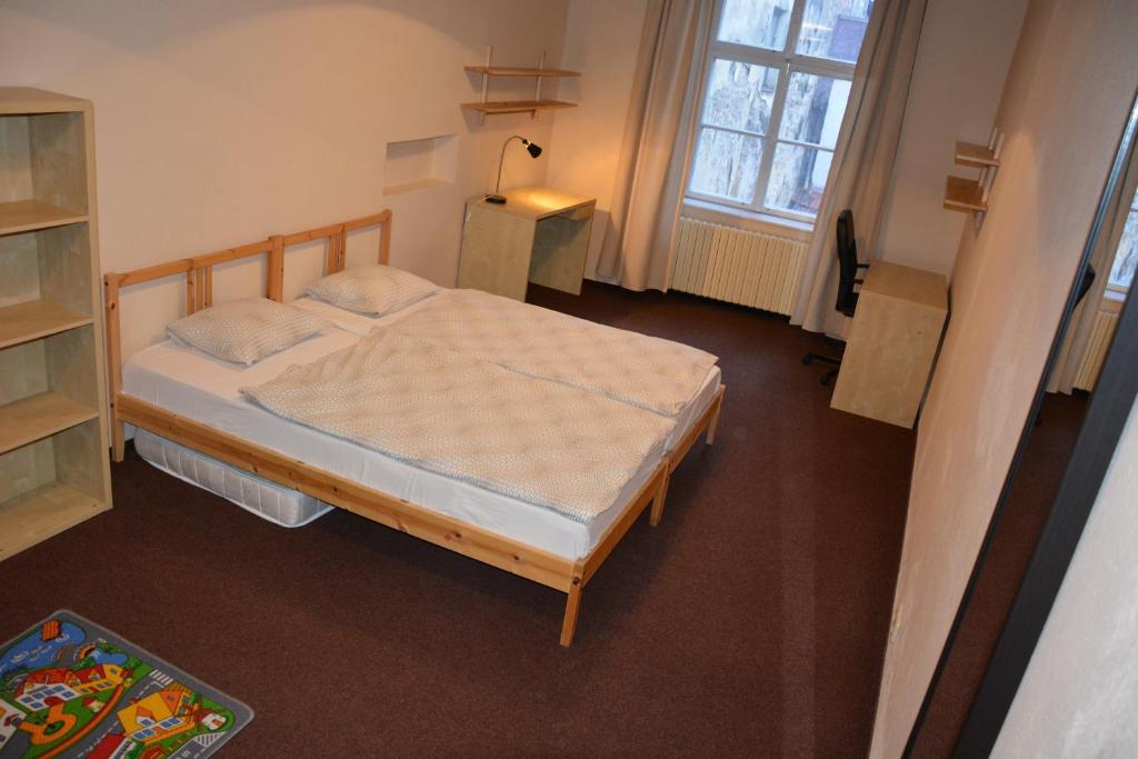 Postel nebo postele na pokoji v ubytování Apartments 163/I