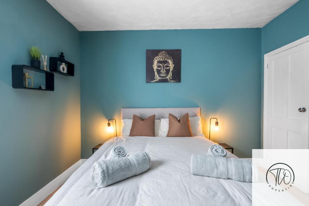 Ένα ή περισσότερα κρεβάτια σε δωμάτιο στο 2BR House -Centrally Located