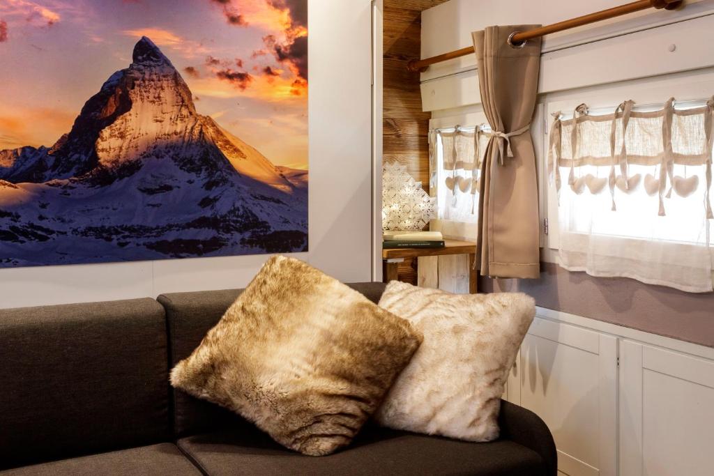 Et opholdsområde på HelloCHALET Cervinia - Ski-in Ski-out Studio, 200mt at Plan Maison Lift