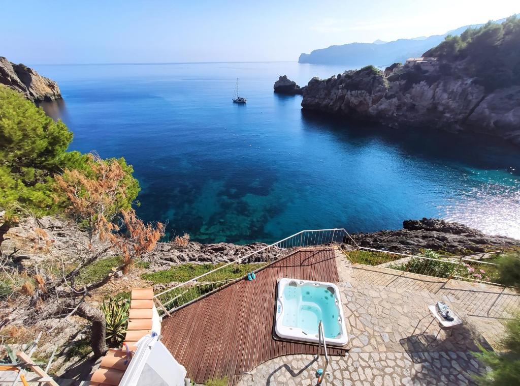a view of the ocean from a house at VILLA CA LA DOLORS Cala Deià in Deia