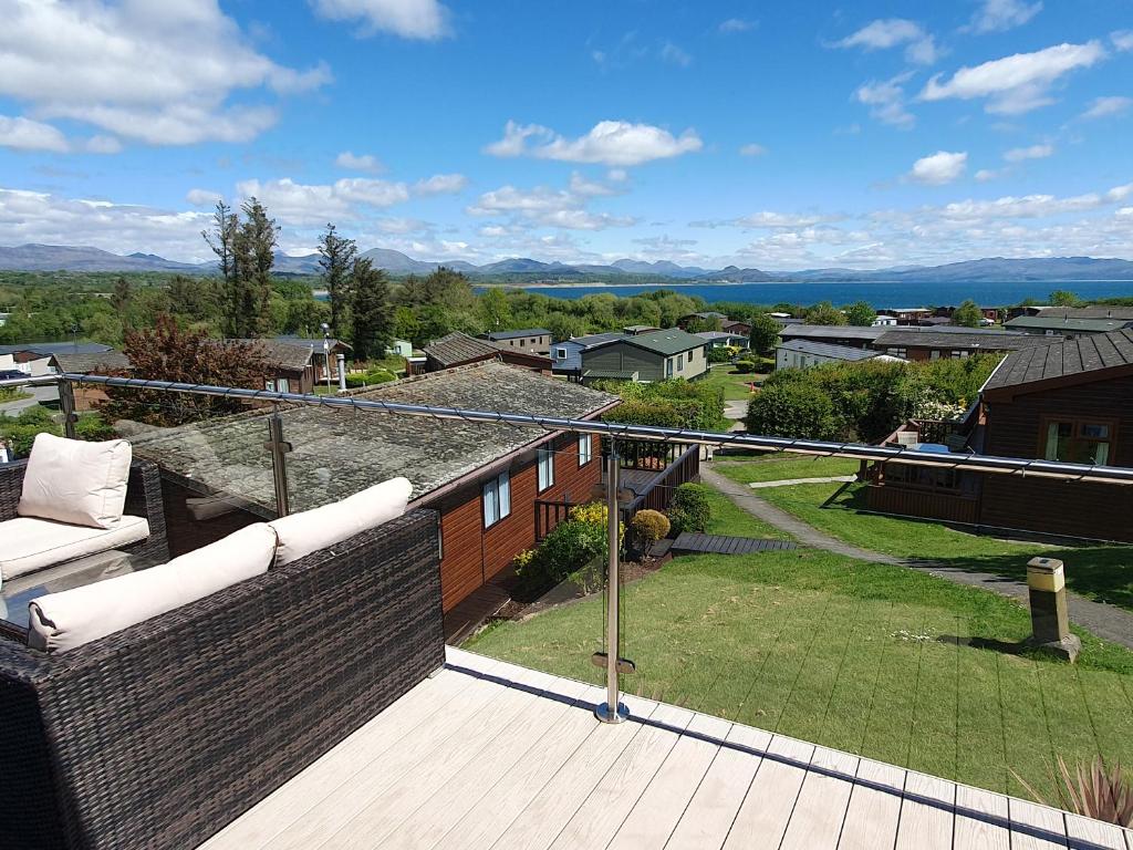 a balcony with a view of a yard at The Hideaway in Afon Wen Junction