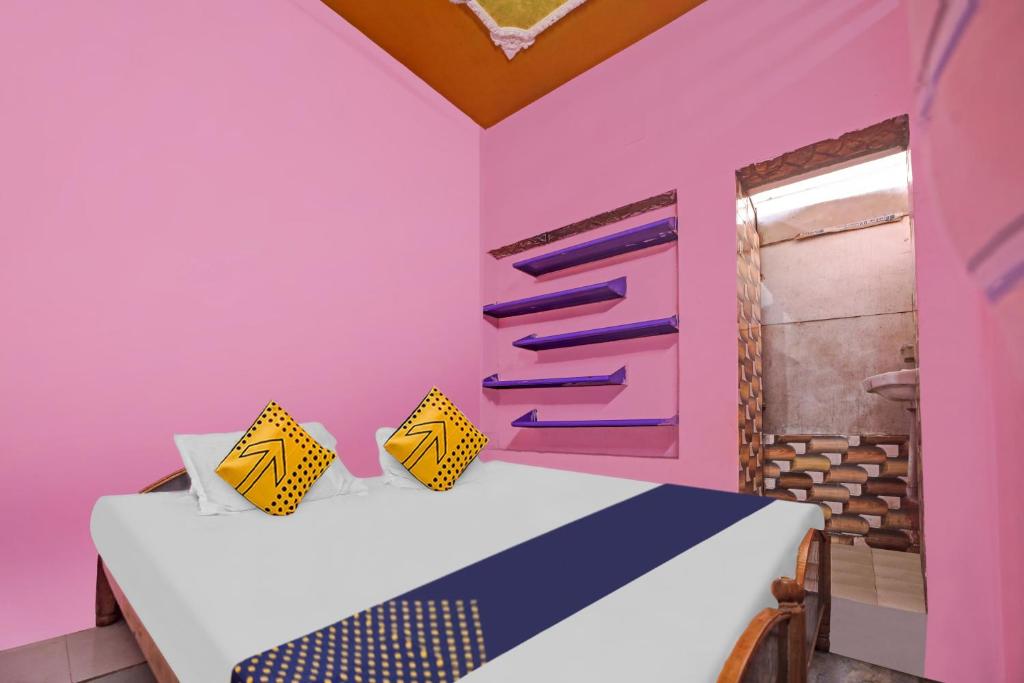 Ένα ή περισσότερα κρεβάτια σε δωμάτιο στο Hotel O City Era