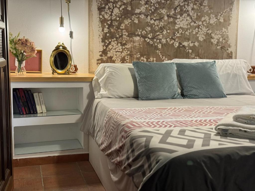 Giường trong phòng chung tại Casa Patio Corduba