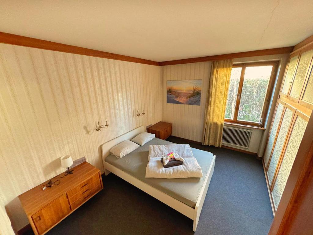 Кровать или кровати в номере Vintage Tirol Apartment