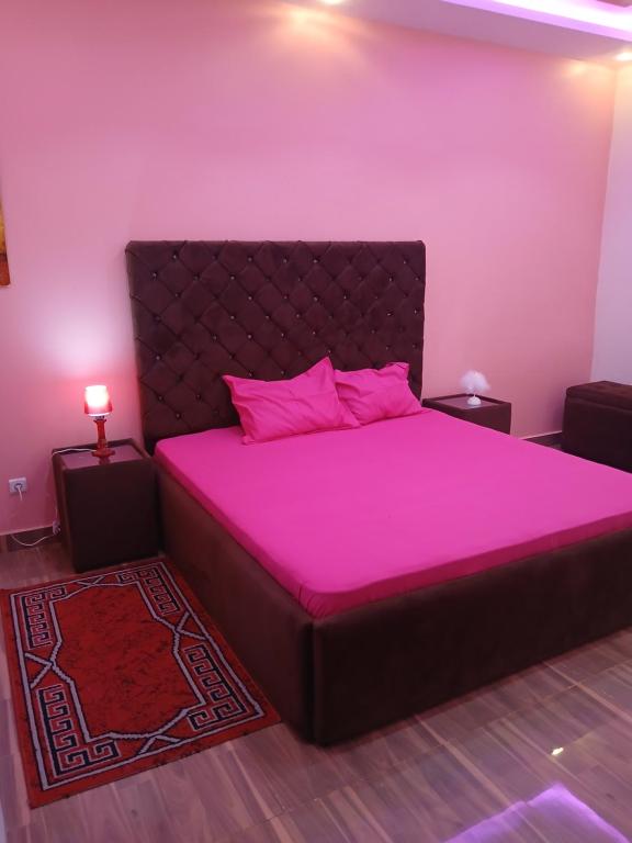 Katil atau katil-katil dalam bilik di Chez dija