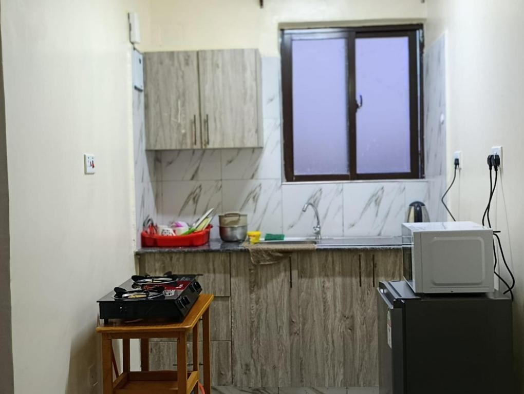 Η κουζίνα ή μικρή κουζίνα στο Majestic Studio Kikuyu