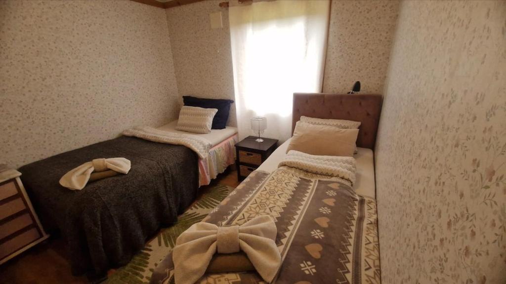 Ένα ή περισσότερα κρεβάτια σε δωμάτιο στο Apartment in peacefull surroundings