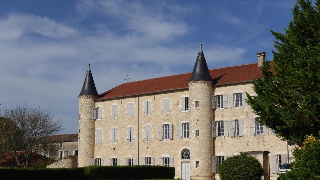 a large building with two towers on top of it at Couvent de Vaylats in Vaylats