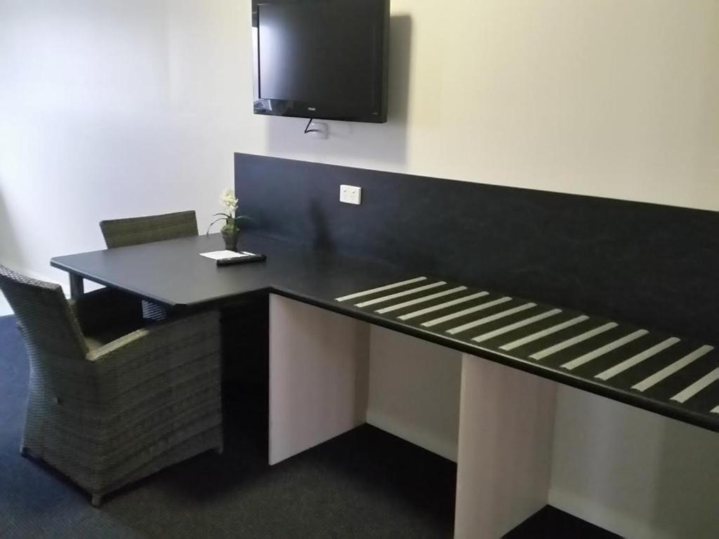 Kuchyň nebo kuchyňský kout v ubytování Augathella Palms Motel