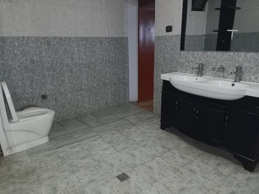 Koupelna v ubytování Grace Guest House