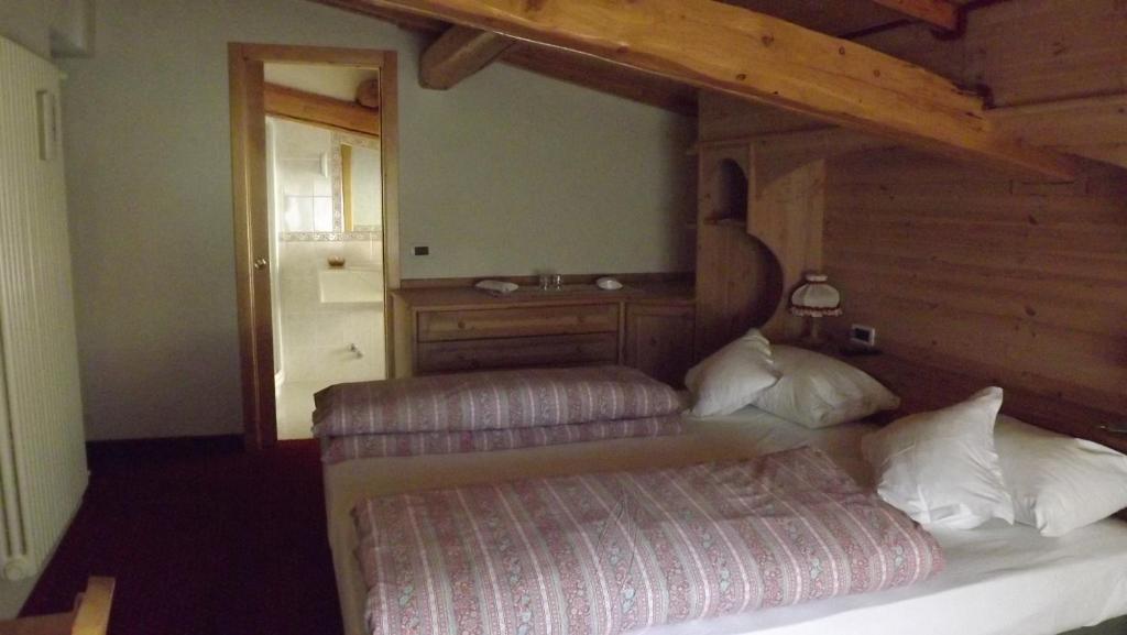 Voodi või voodid majutusasutuse HOTEL GARNi NORMA toas