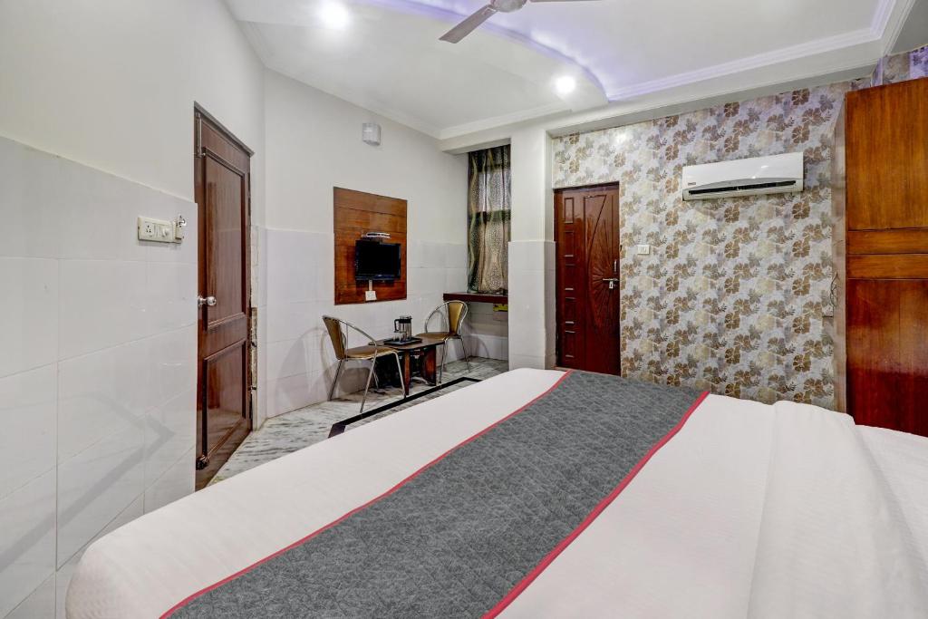 Postel nebo postele na pokoji v ubytování Hotel O ASA AGRA