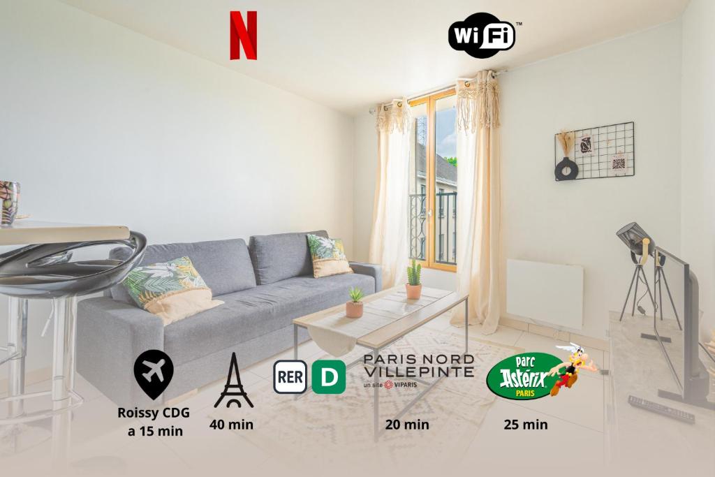 a living room with a gray couch and a tv at Urban Oasis, RER D, CDG Aéroport, Parc des Expos in Gonesse