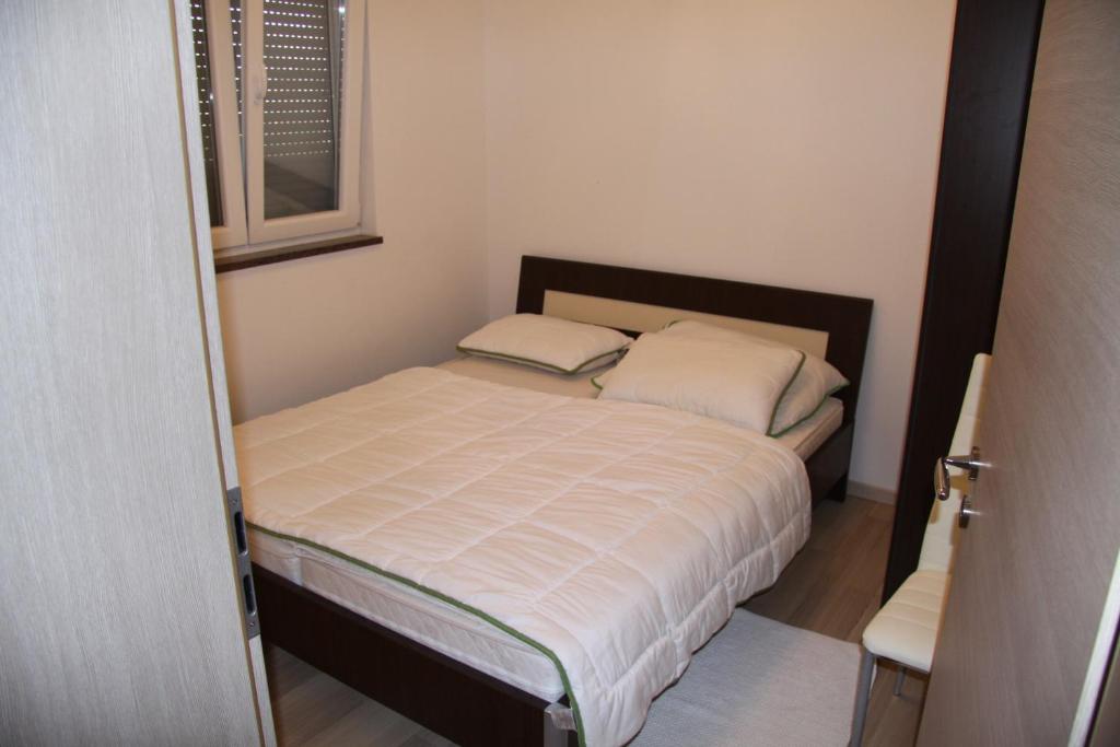 Posteľ alebo postele v izbe v ubytovaní Apartment Pal
