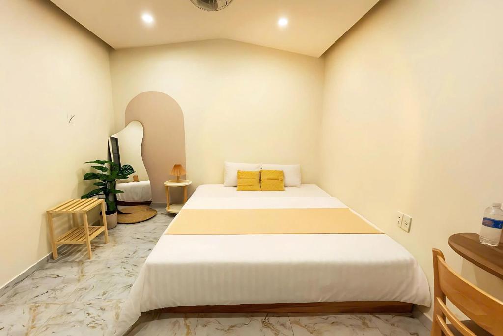 Ένα ή περισσότερα κρεβάτια σε δωμάτιο στο Lune House Da Lat