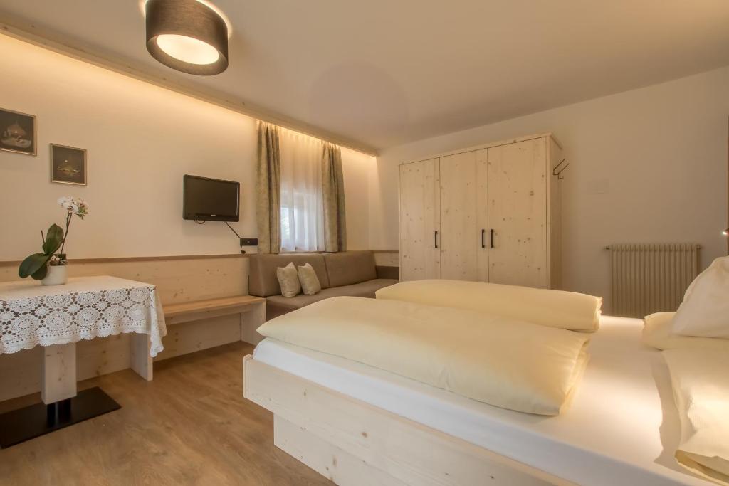 Pensione Camoscio - Vorgesetzter Vierfachraum