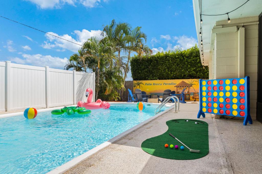 a swimming pool with at Seminole Shores Private Pool Outdoor Games Wifi in Redington Shores