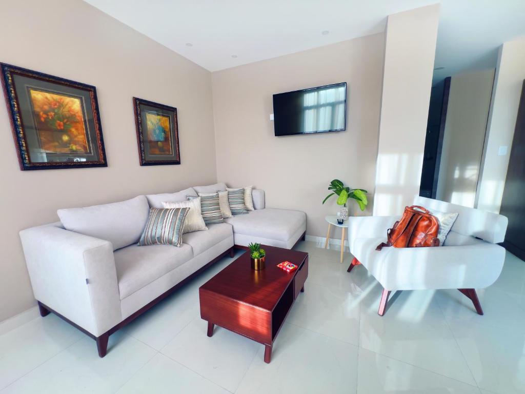 Posezení v ubytování Apartamento Minimalista en el Centro de Loja