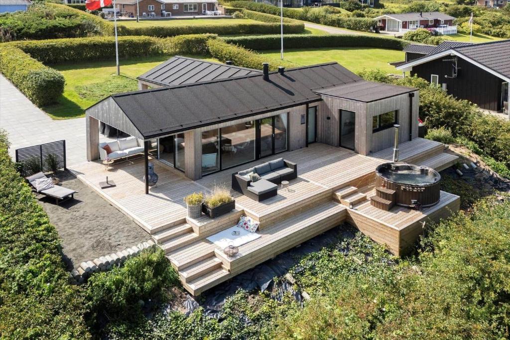 an aerial view of a house with a grill at G322-Lemvig-Gyvelvej-22 in Lemvig