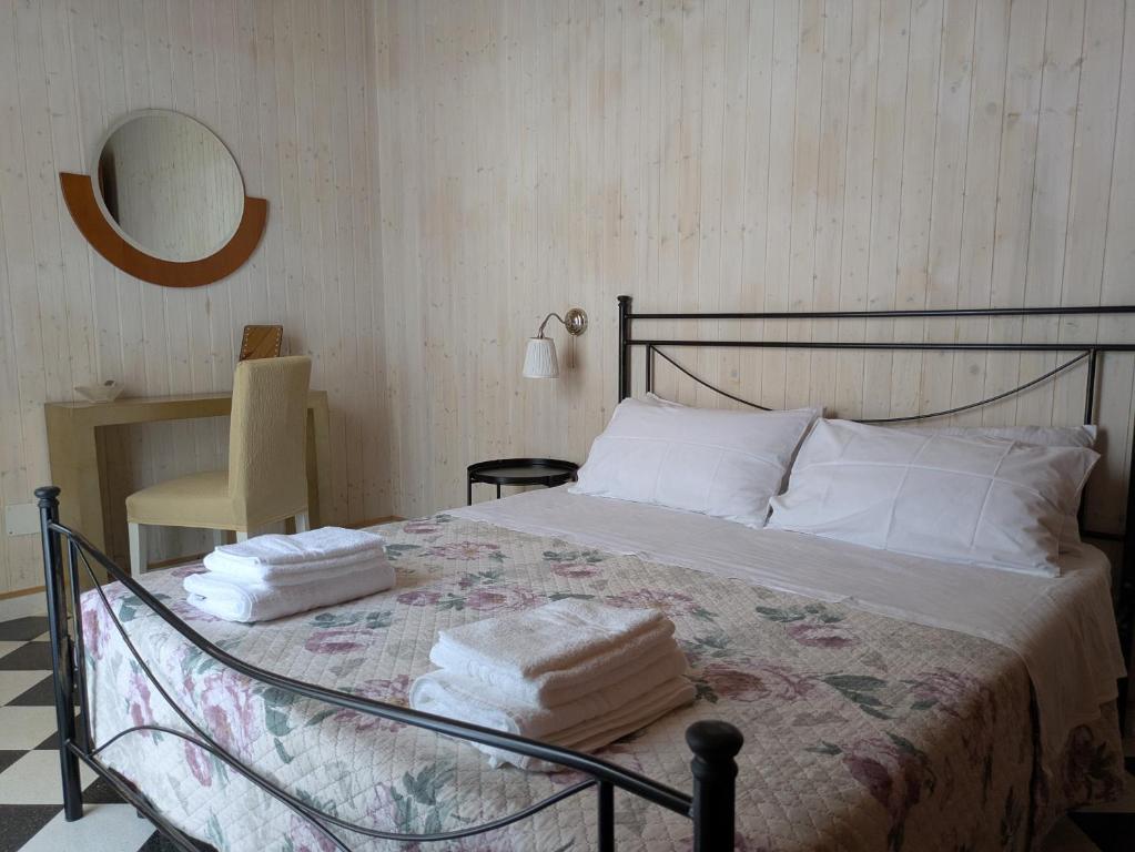 Postel nebo postele na pokoji v ubytování La Casa a Corte