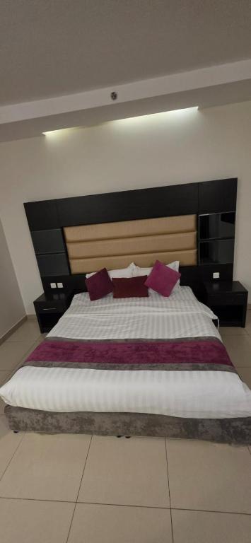 Ένα ή περισσότερα κρεβάτια σε δωμάτιο στο Smart Room Al-Washm