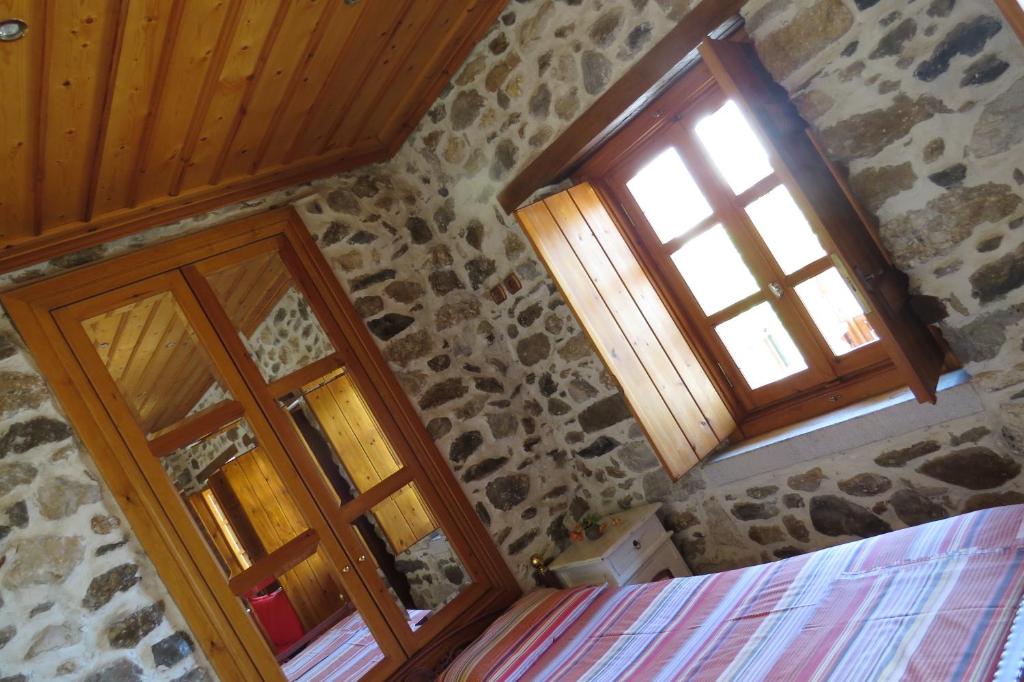 Postel nebo postele na pokoji v ubytování Mystras Inn