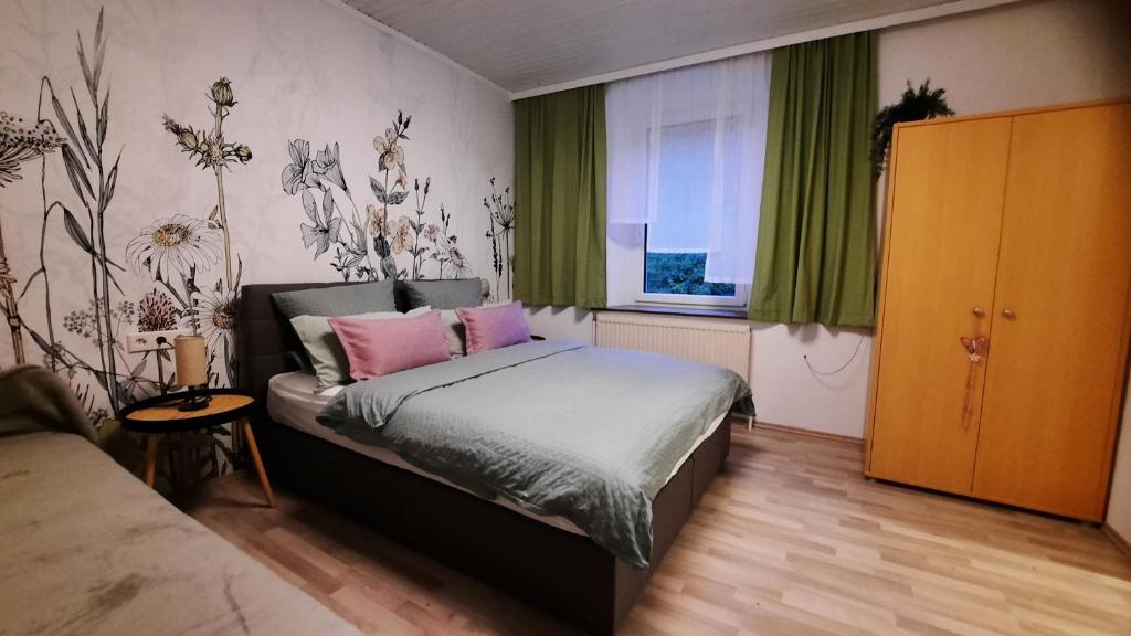Postel nebo postele na pokoji v ubytování Studio Wildwiese Rettenegg