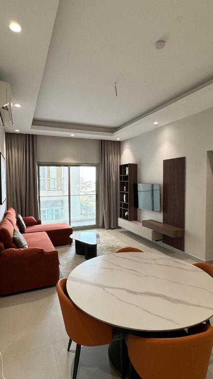 O zonă de relaxare la Muscat City Stay-2BR Apt 201 near Grand & Avenue Mall
