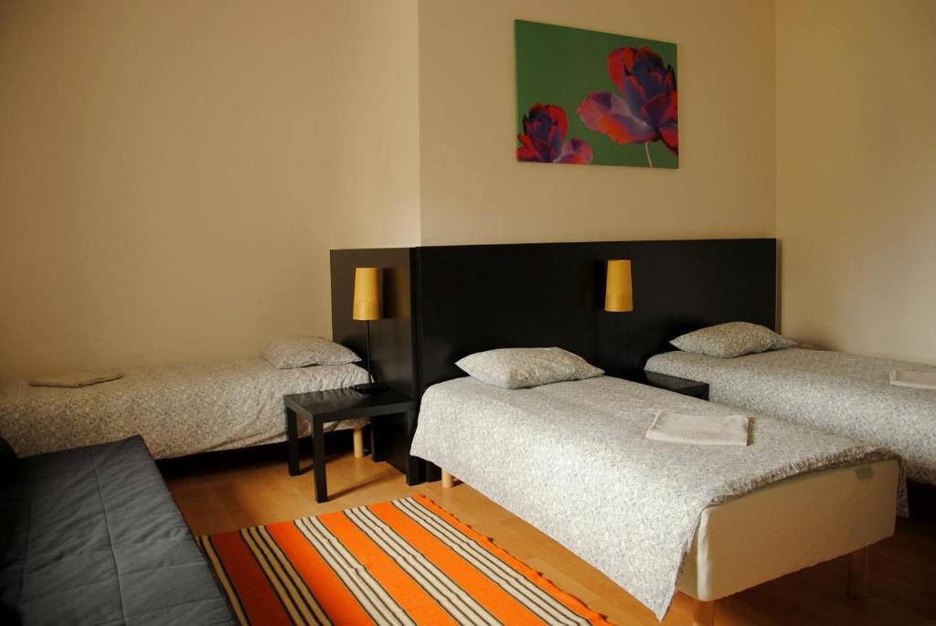 Postel nebo postele na pokoji v ubytování Central Station Hostel