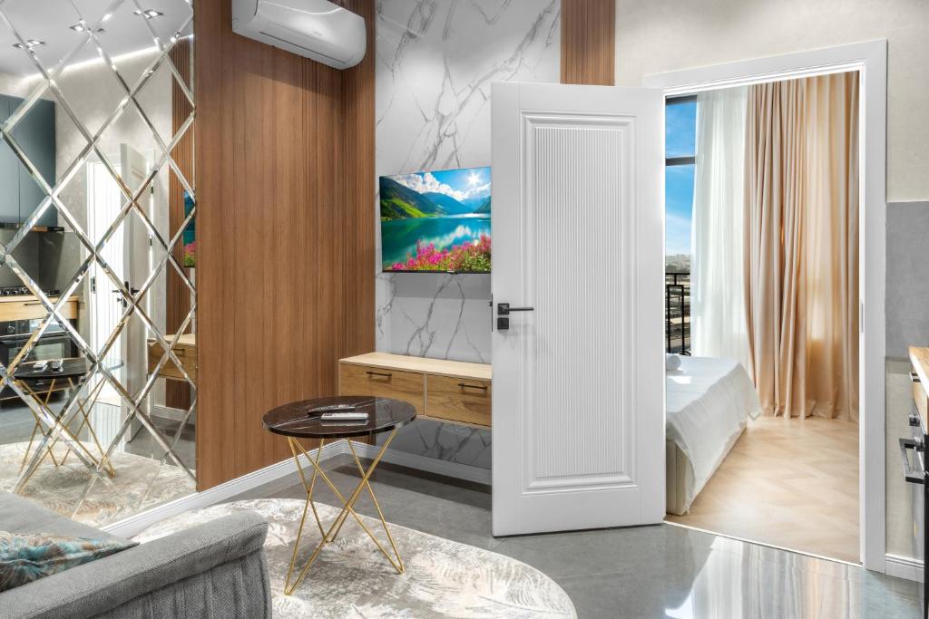 Fotografie z fotogalerie ubytování Уютная квартира стиле минимализм ЖК Prestige Gardens v destinaci Stantsiya Kyzyl-Tukumachi
