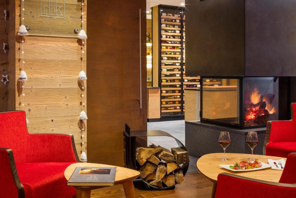 Posezení v ubytování Hôtel Restaurant Logis Auberge Sundgovienne
