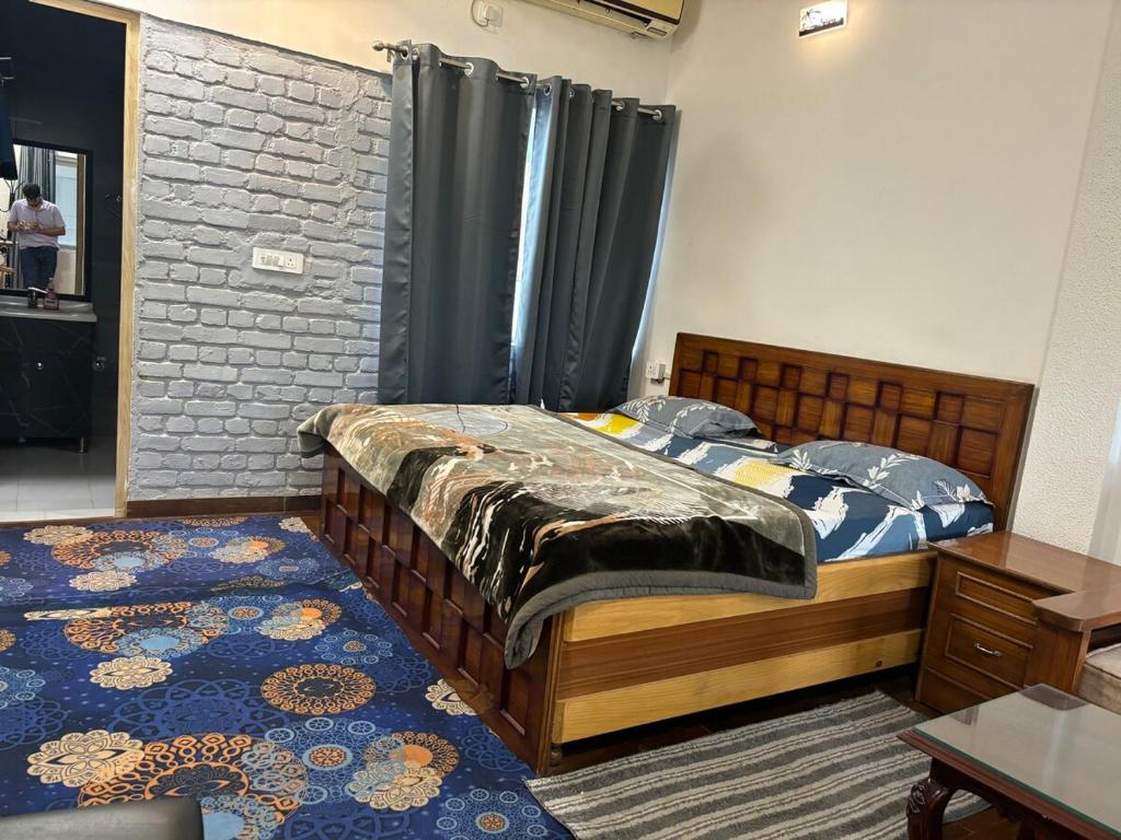 Ένα ή περισσότερα κρεβάτια σε δωμάτιο στο Shakun homes